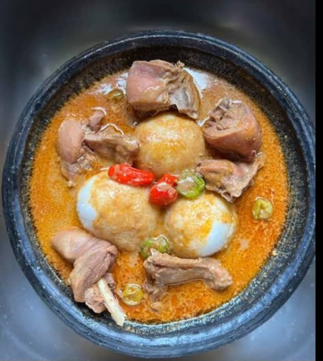 Omotuo with chicken groundnut soup