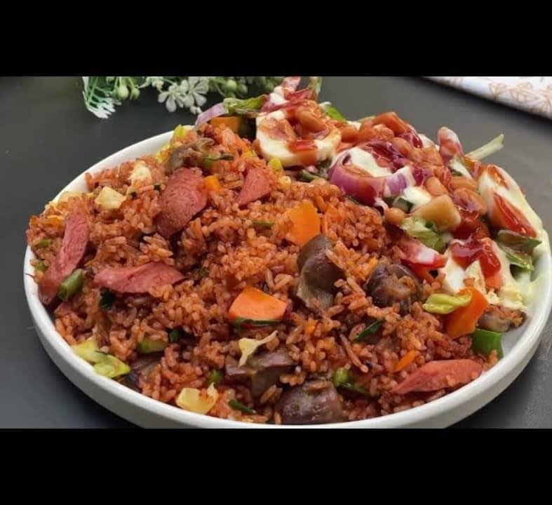 Assorted Jollof rice with salad.